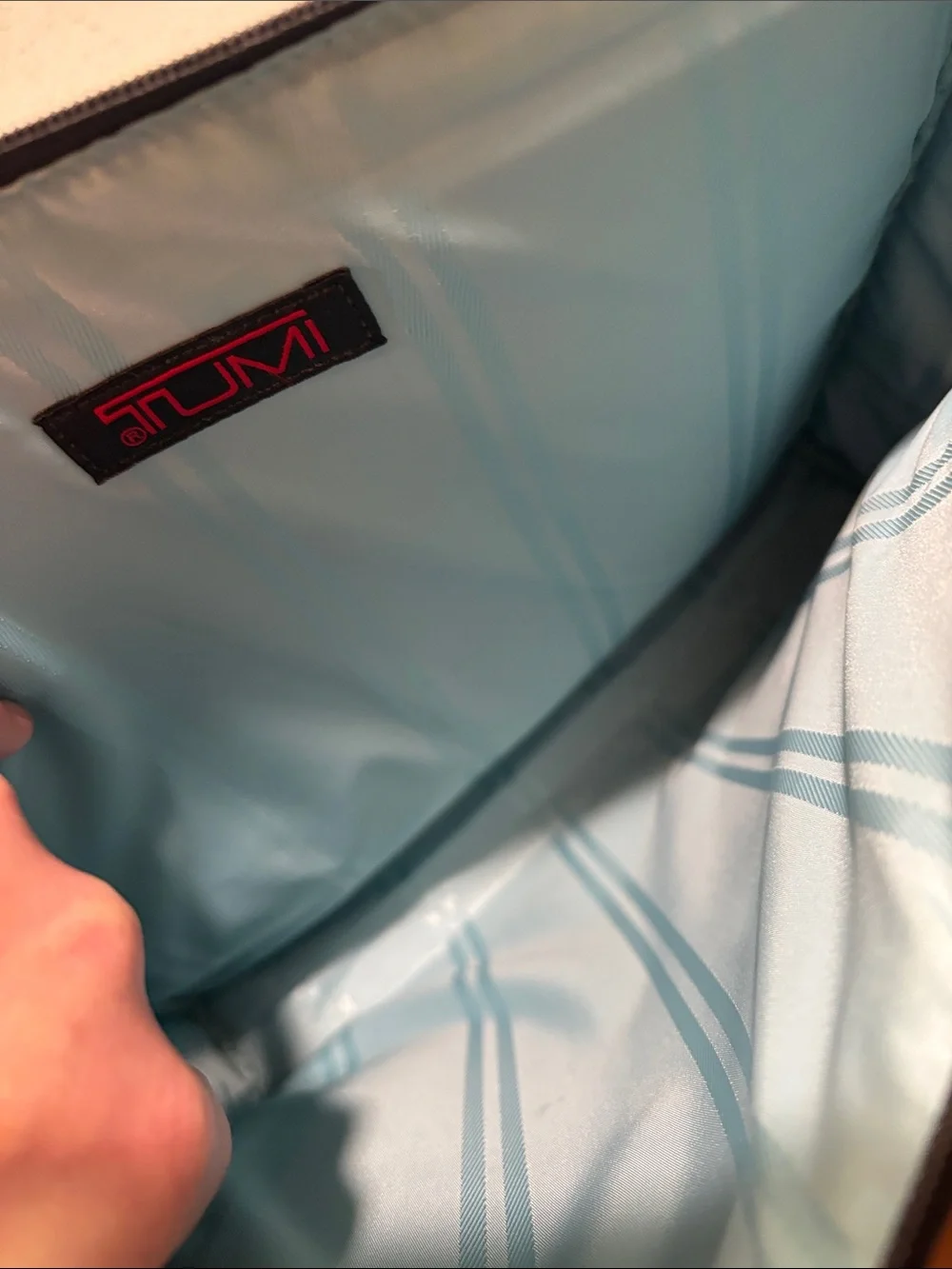 Tumi sleek black